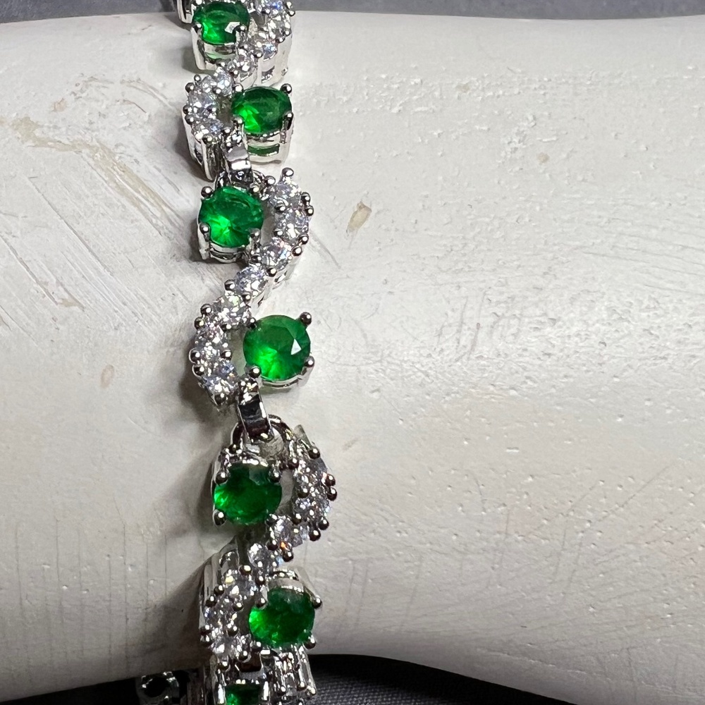 Silver toned infinity style bracelet. Beautifully crafted.